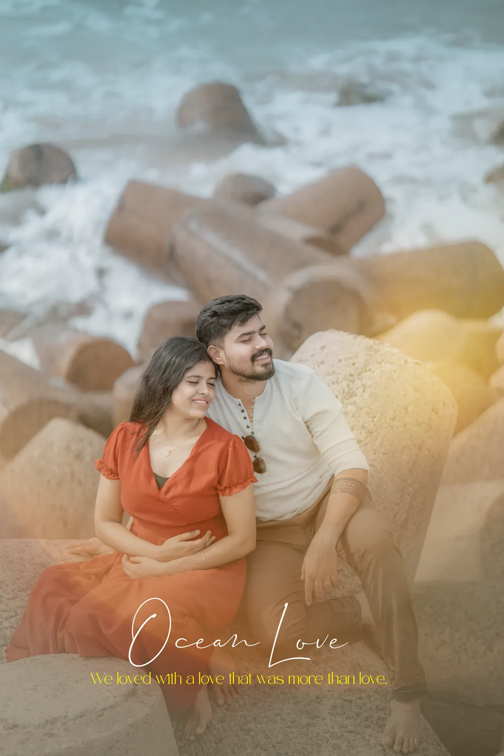 Couple on the rocks by the sea