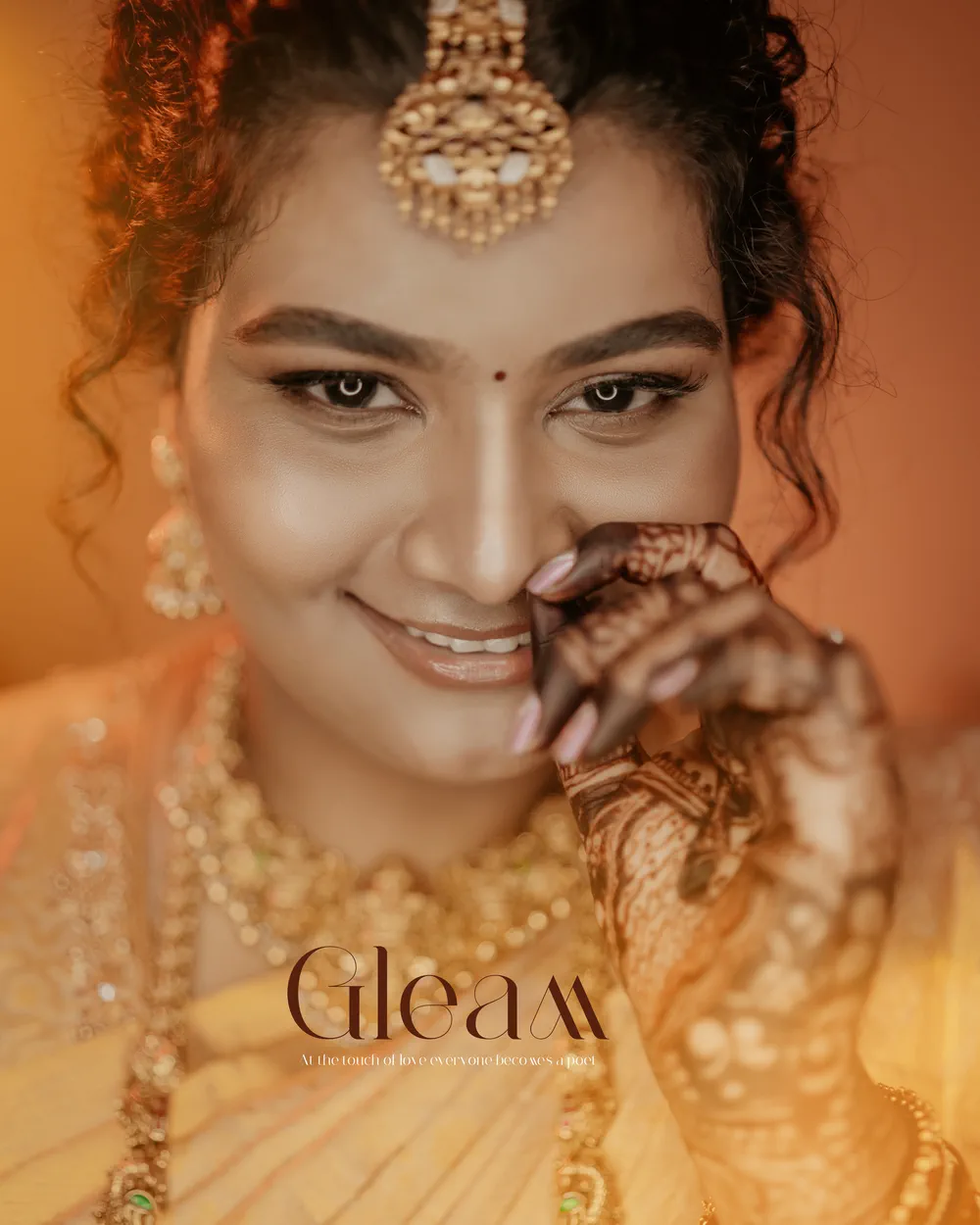 Bridal portrait, gold jewellery and a quiet smile
