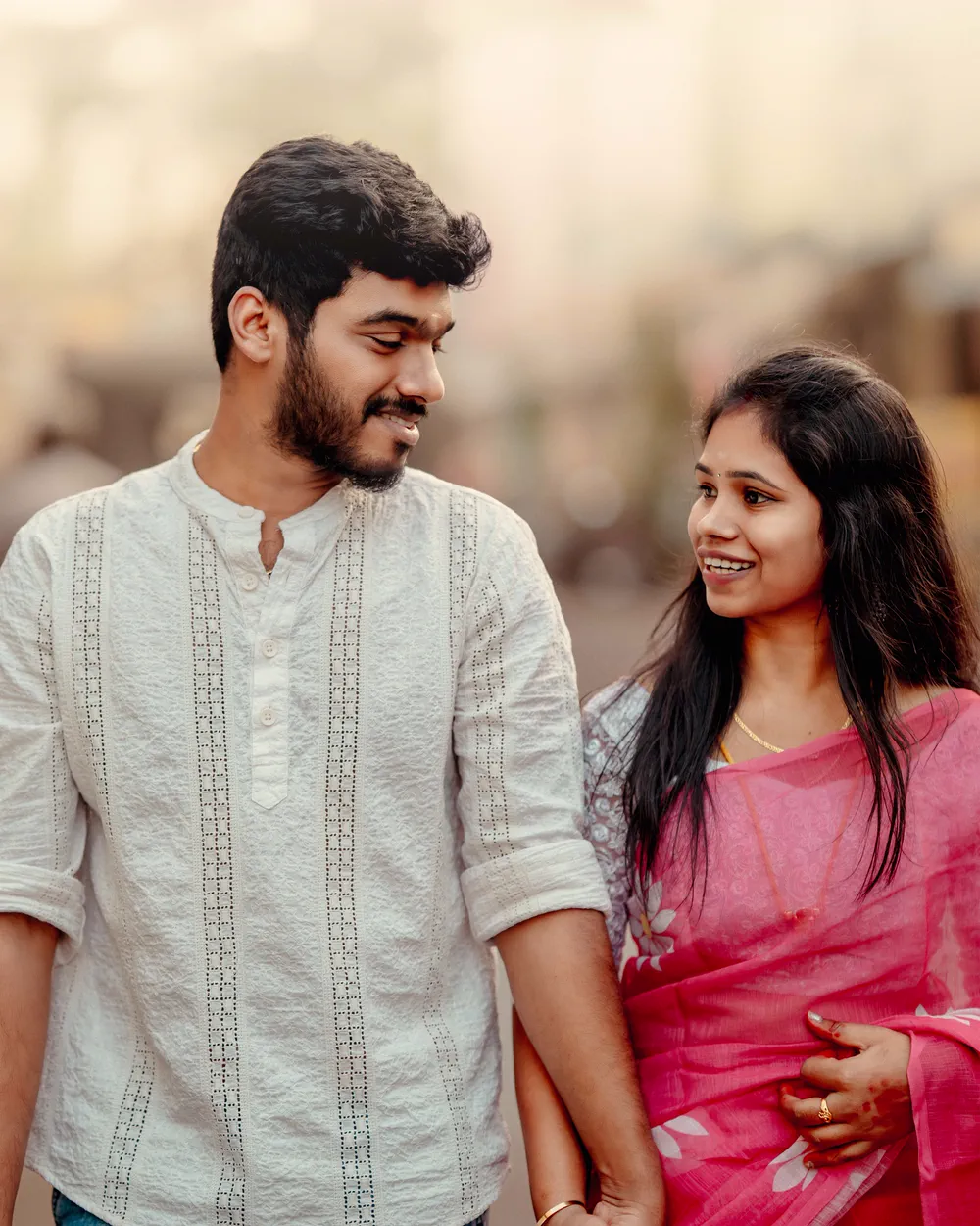 Couple laughing during a pre-wedding session